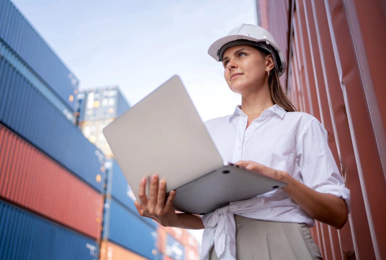 Logistics professional working at a container terminal