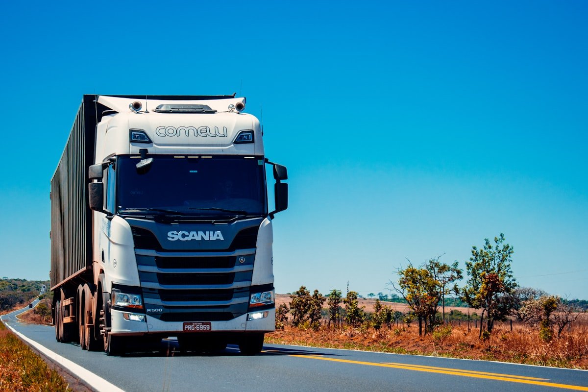 Freight trucks moving cargo along a regional corridor